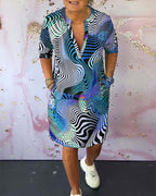 Ria - Elegáns V-nyakú Ruha