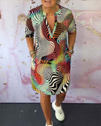 Ria - Elegáns V-nyakú Ruha